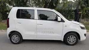 2024 Suzuki Wagon R VXL: Low Mileage, White, Minor Cosmetic Wear, Well