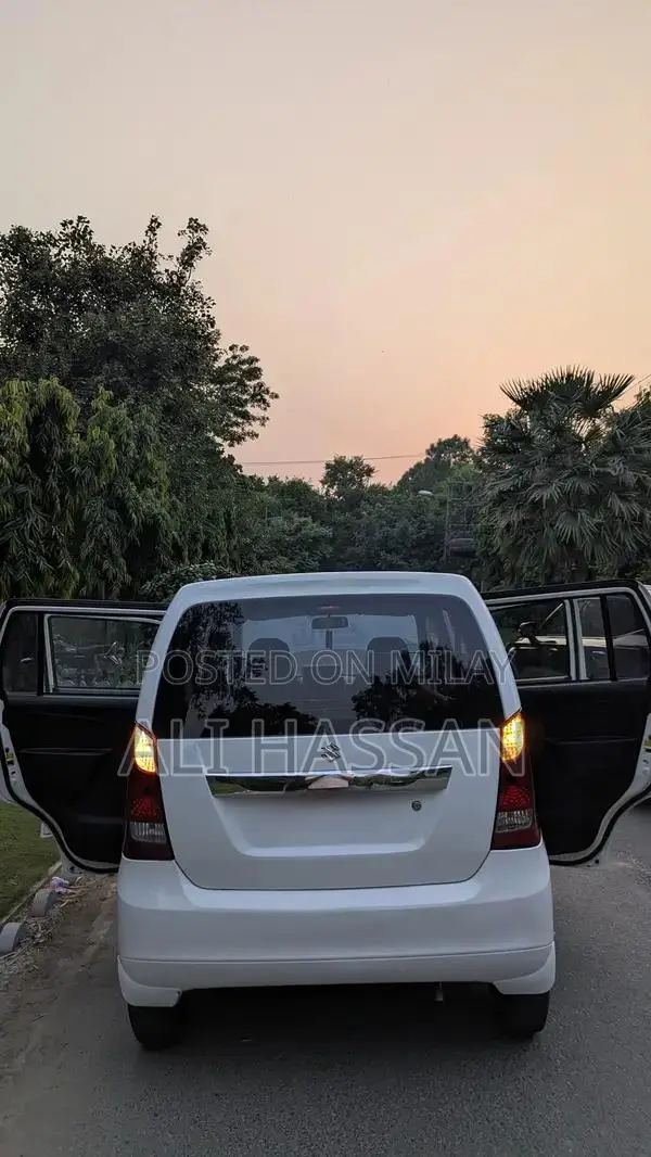 2024 Suzuki Wagon R VXL: Low Mileage, White, Minor Cosmetic Wear, Well