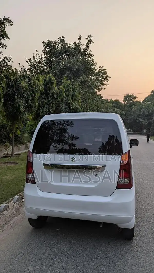 2024 Suzuki Wagon R VXL: Low Mileage, White, Minor Cosmetic Wear, Well