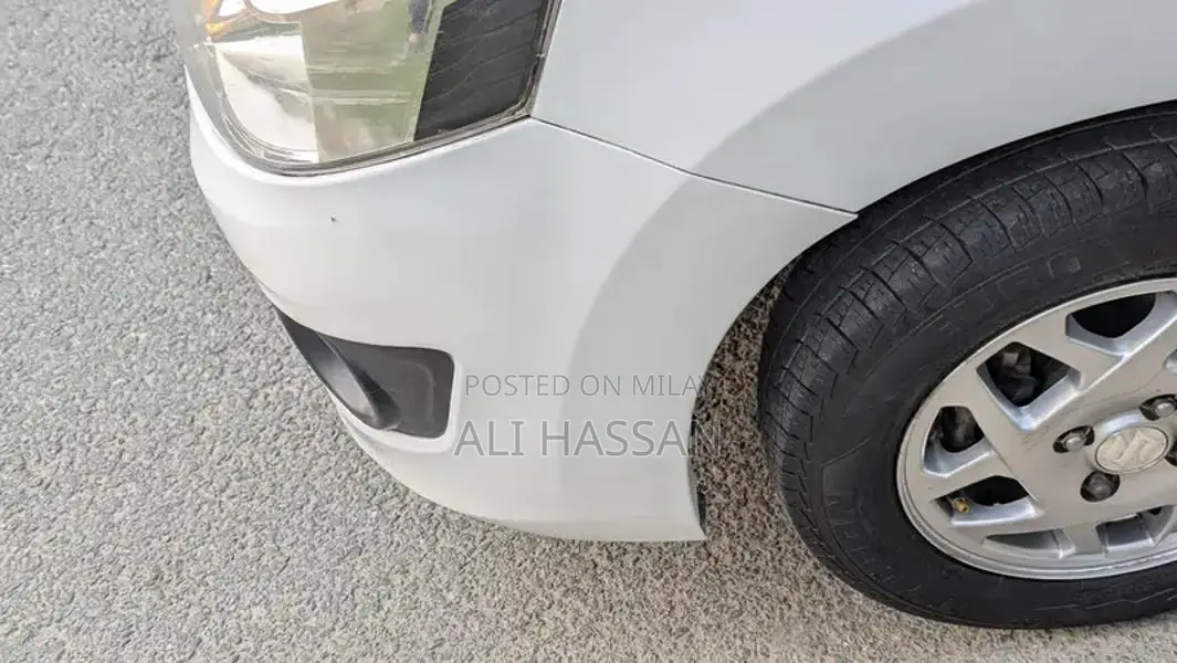 2024 Suzuki Wagon R VXL: Low Mileage, White, Minor Cosmetic Wear, Well