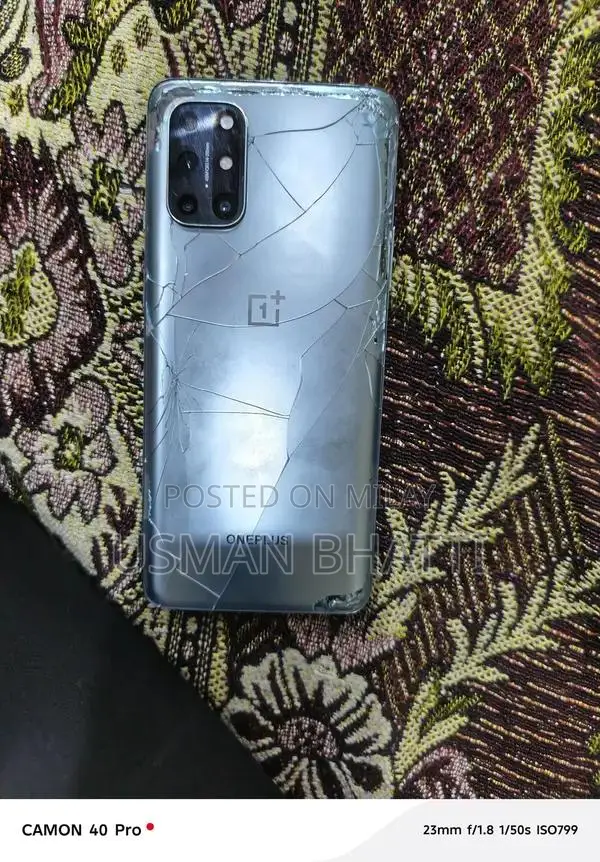 OnePlus 8T Smartphone - Partially Damaged Back Panel, Functional Condi
