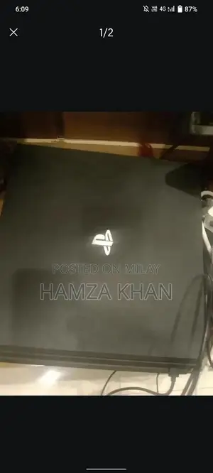 PlayStation 4 Pro 1TB Gaming Console with Games