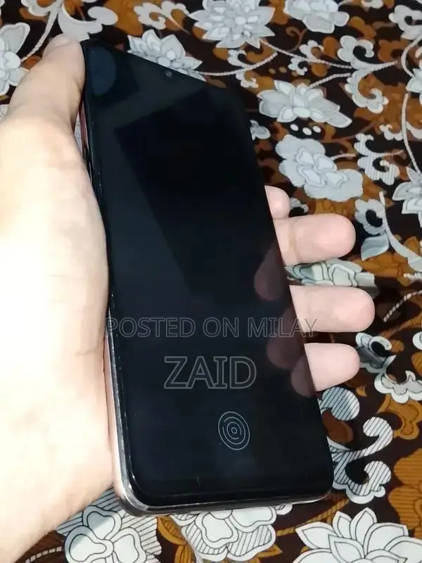 Sleek Smartphone with Dark Mode and Clean Condition