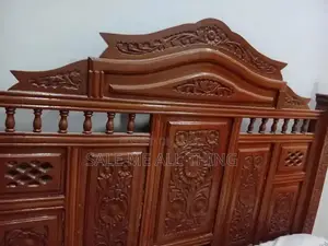 Photo - Wooden Bed with Side Table - Comfortable Sleeping Solution