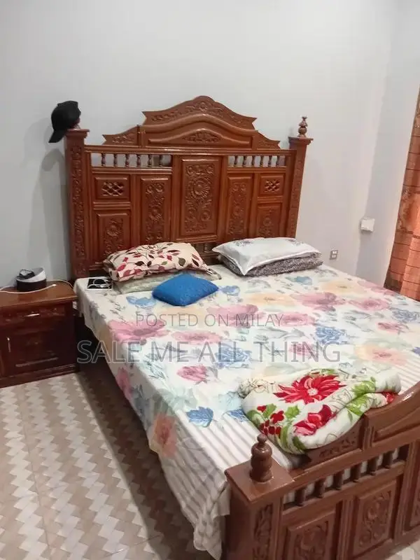 Wooden Bed with Side Table - Comfortable Sleeping Solution