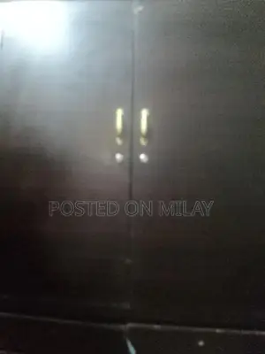 Photo - Safe and Sturdy Wooden Armoire for Bedroom Storage