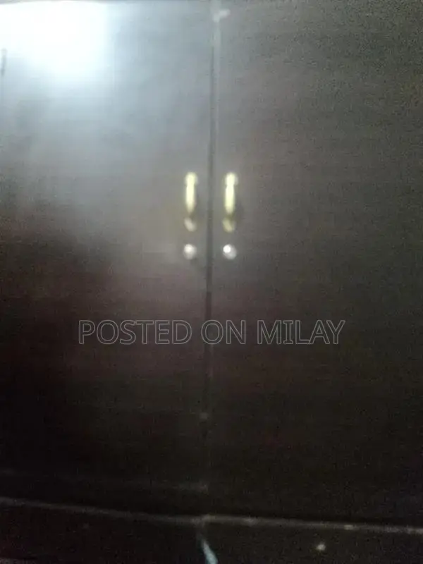 Safe and Sturdy Wooden Armoire for Bedroom Storage