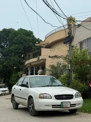 Photo - Suzuki Baleno JXR Sedan - Well-Maintained Reliable Compact Car