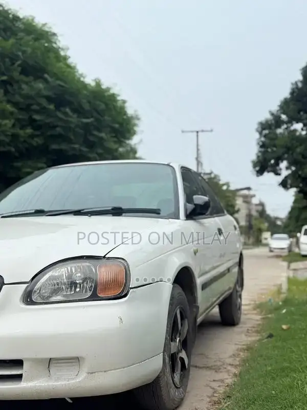 Suzuki Baleno JXR Sedan - Well-Maintained Reliable Compact Car