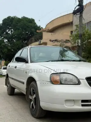 Suzuki Baleno JXR Sedan - Well-Maintained Reliable Compact Car