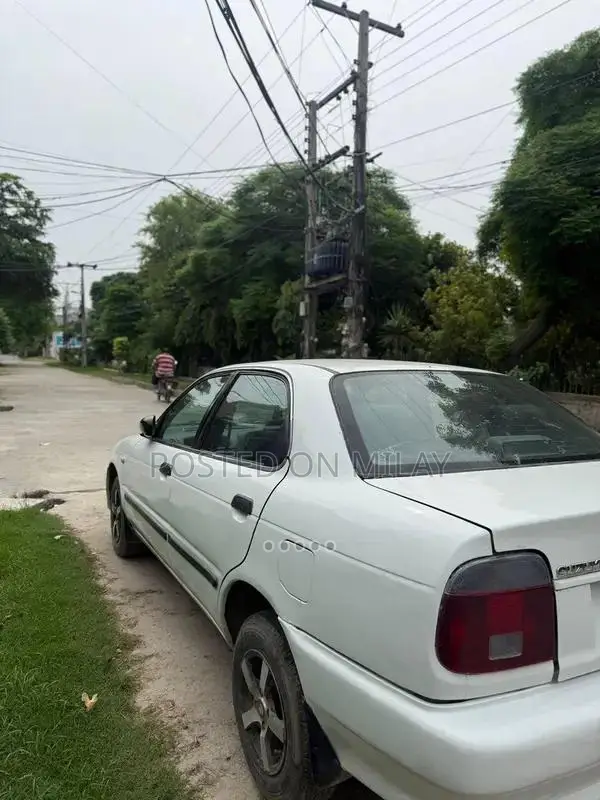 Suzuki Baleno JXR Sedan - Well-Maintained Reliable Compact Car