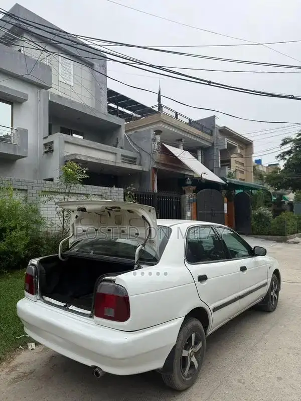 Suzuki Baleno JXR Sedan - Well-Maintained Reliable Compact Car