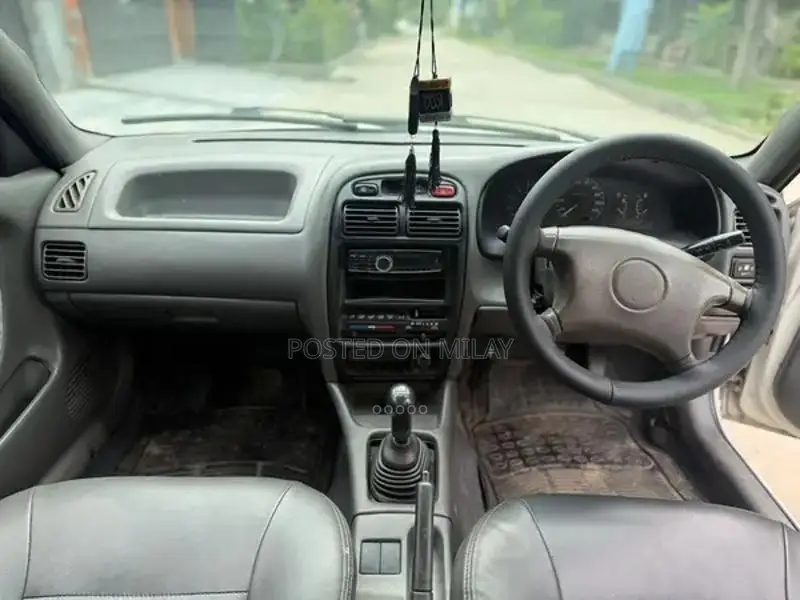 Suzuki Baleno JXR Sedan - Well-Maintained Reliable Compact Car