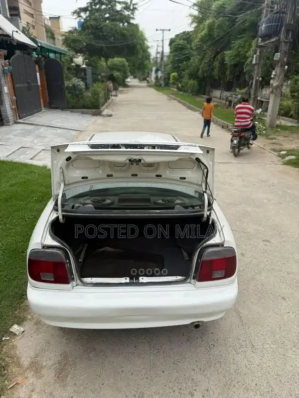 Suzuki Baleno JXR Sedan - Well-Maintained Reliable Compact Car