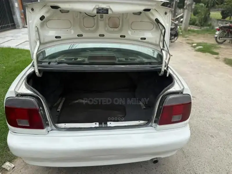 Suzuki Baleno JXR Sedan - Well-Maintained Reliable Compact Car