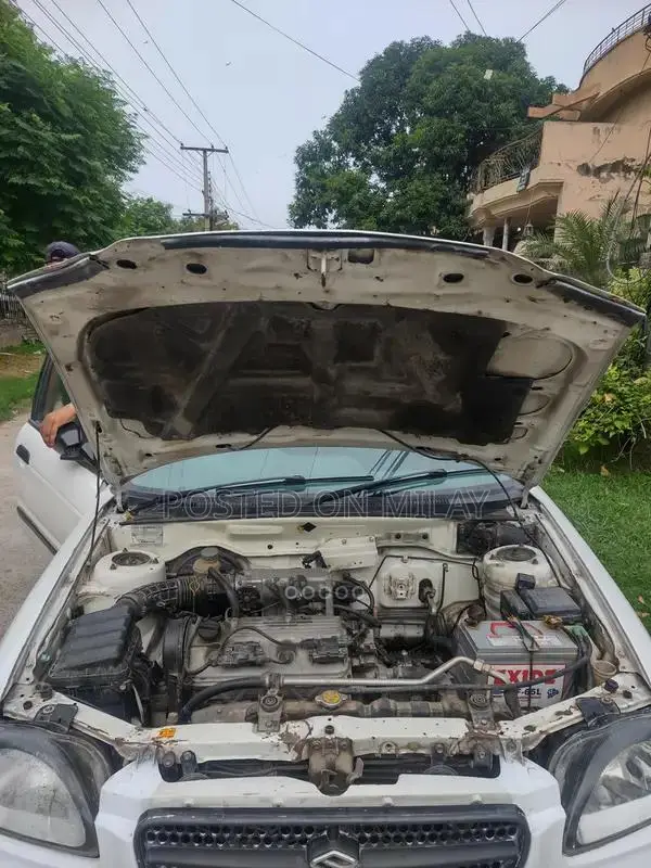 Suzuki Baleno JXR Sedan - Well-Maintained Reliable Compact Car