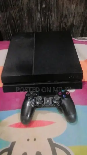 Photo - PlayStation 4 Gaming Console - Powerful Home Entertainment System