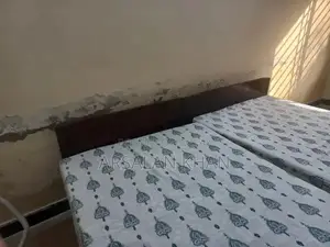 Photo - Two Single Wooden Shesham Wood Beds with Foam Mattresses