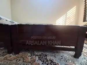 Two Single Wooden Shesham Wood Beds with Foam Mattresses