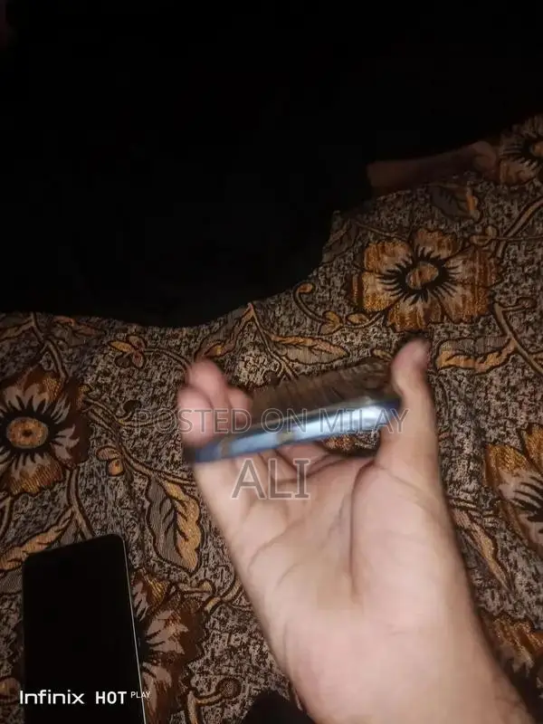 Budget Smartphone with Glass Display and Compact Design