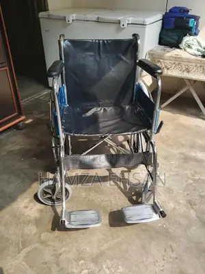 Photo - Durable Steel Wheelchair with Leather Upholstery