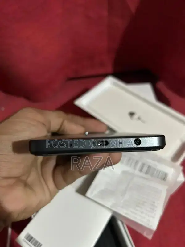 Mid-Range Smartphone with Compact Design and Ample Storage