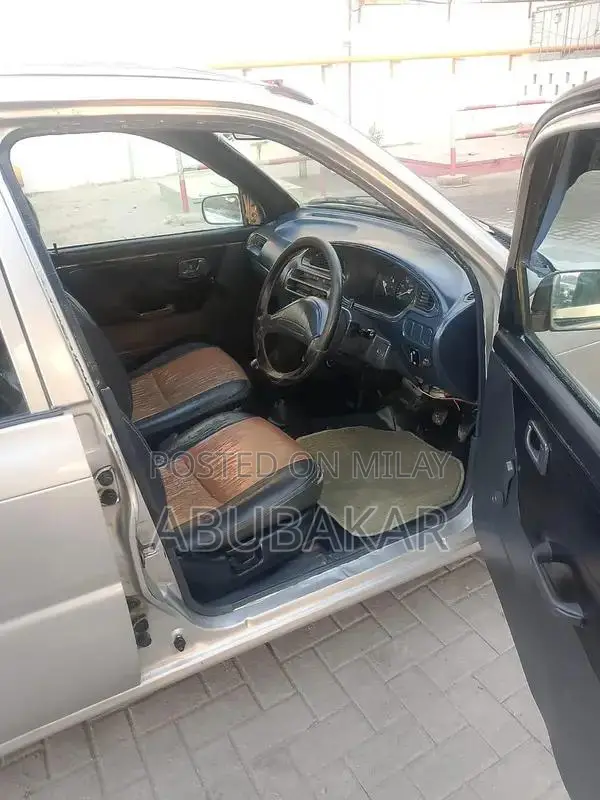 Daihatsu Coure 2006 Compact Sedan with CNG Conversion