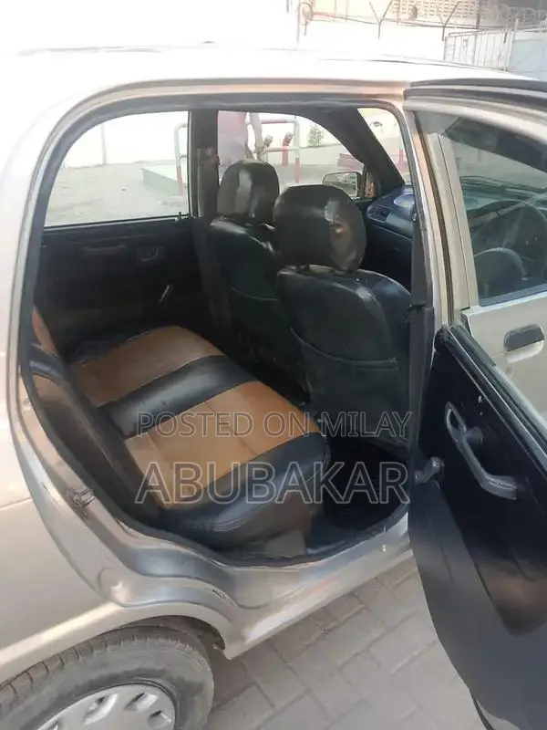 Daihatsu Coure 2006 Compact Sedan with CNG Conversion