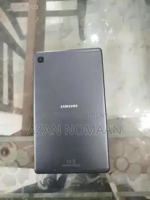 Photo - Samsung Tablet - Sleek Mobile Device for Productivity and Entertainmen