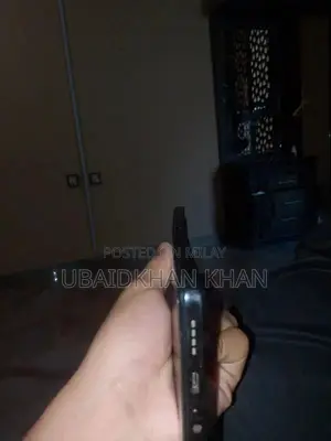 Smartphone with Charging Box and Partial Accessories