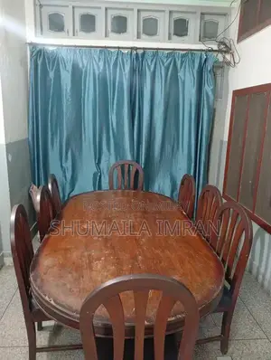 Solid Wood 8-Seat Dining Table Set in Good Condition