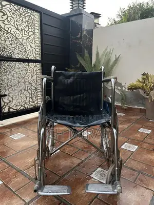 Photo - Sturdy Mobility Wheelchair - Reliable Personal Transportation Solution