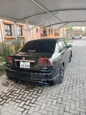 Photo - Honda Civic VTI Mid-Size Sedan - Reliable Compact Car