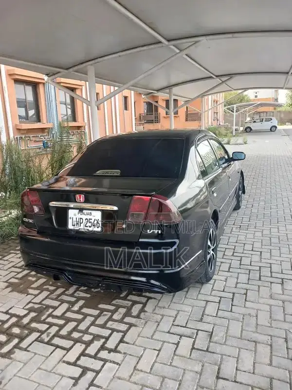 Honda Civic VTI Mid-Size Sedan - Reliable Compact Car