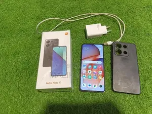 Photo - High-Performance Redmi Smartphone with Original Accessories