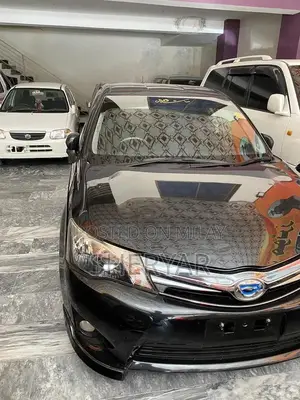 Toyota Fielder Hybrid Sedan - Full Option Comfort Vehicle