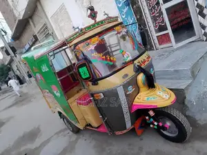 Photo - RozGar Tanaatan Rickshaw Vehicle