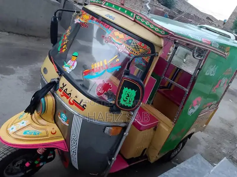 RozGar Tanaatan Rickshaw Vehicle