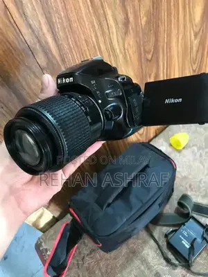 Photo - Nikon D5100 DSLR Camera with 55-200mm Lens Kit