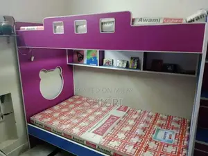 Photo - Compact Bunker-Style Bed for Efficient Space Utilization
