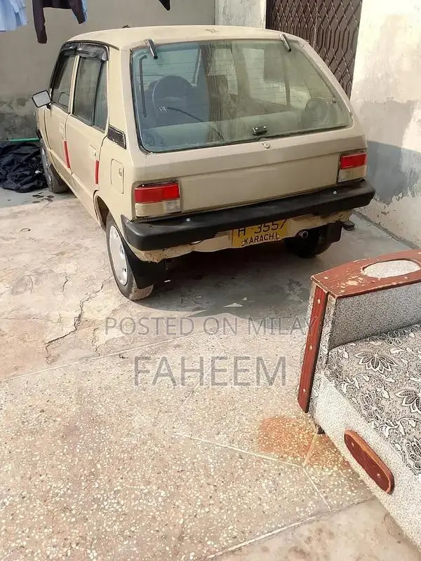 High Mileage 4-Door Car - Imported Vehicle