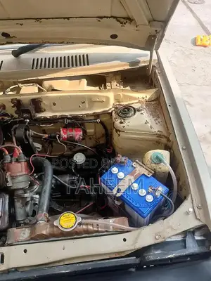 High Mileage 4-Door Car - Imported Vehicle