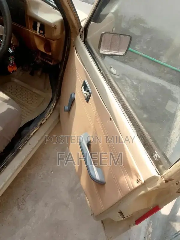 High Mileage 4-Door Car - Imported Vehicle