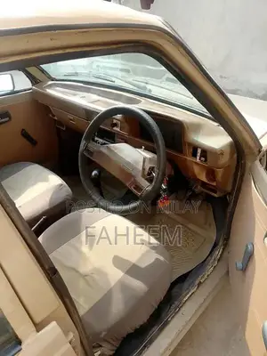 High Mileage 4-Door Car - Imported Vehicle