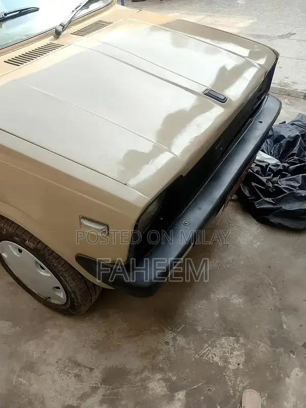 High Mileage 4-Door Car - Imported Vehicle