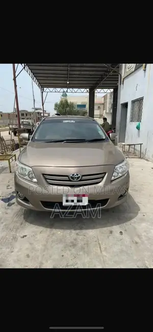 Photo - Toyota Corolla Gli 2009 Sedan with Low Mileage