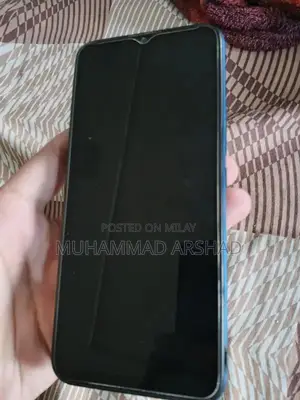 Photo - Budget Smartphone with Dual Camera and Compact Design