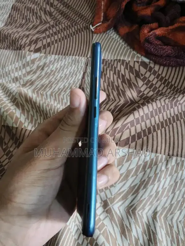 Budget Smartphone with Dual Camera and Compact Design