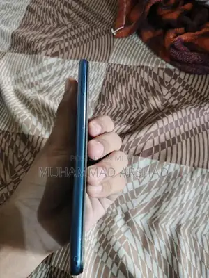 Budget Smartphone with Dual Camera and Compact Design