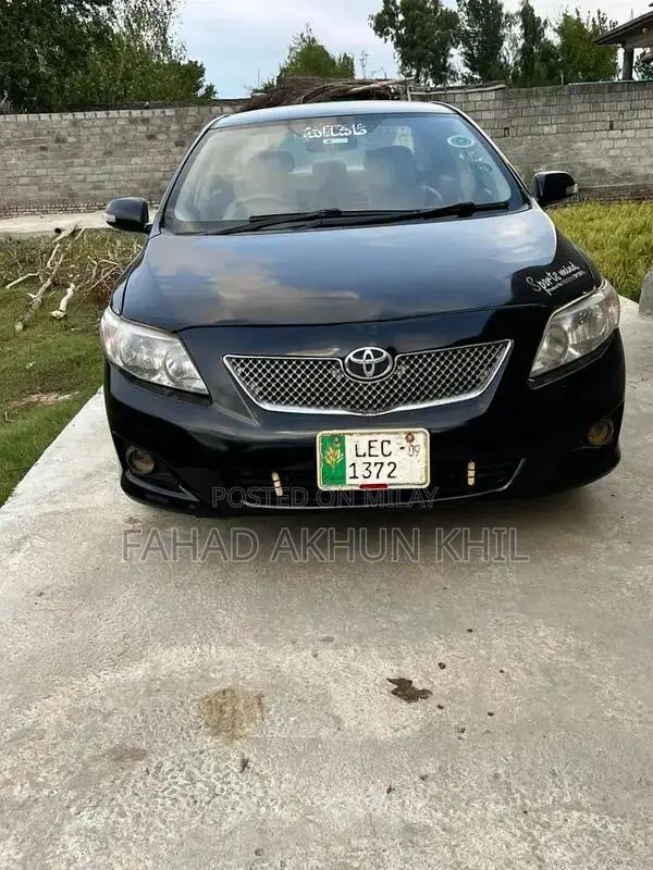 XLI Black Sedan 2009 - Well-Maintained Compact Car